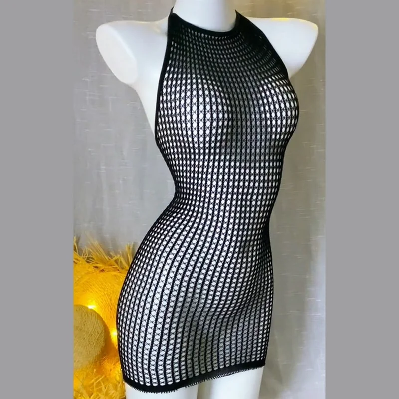 Black fishnet dress prepared for a boudoir session