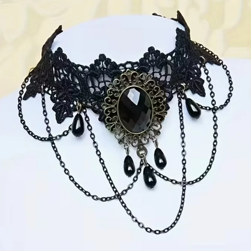 Black lace choker with a vintage pendant