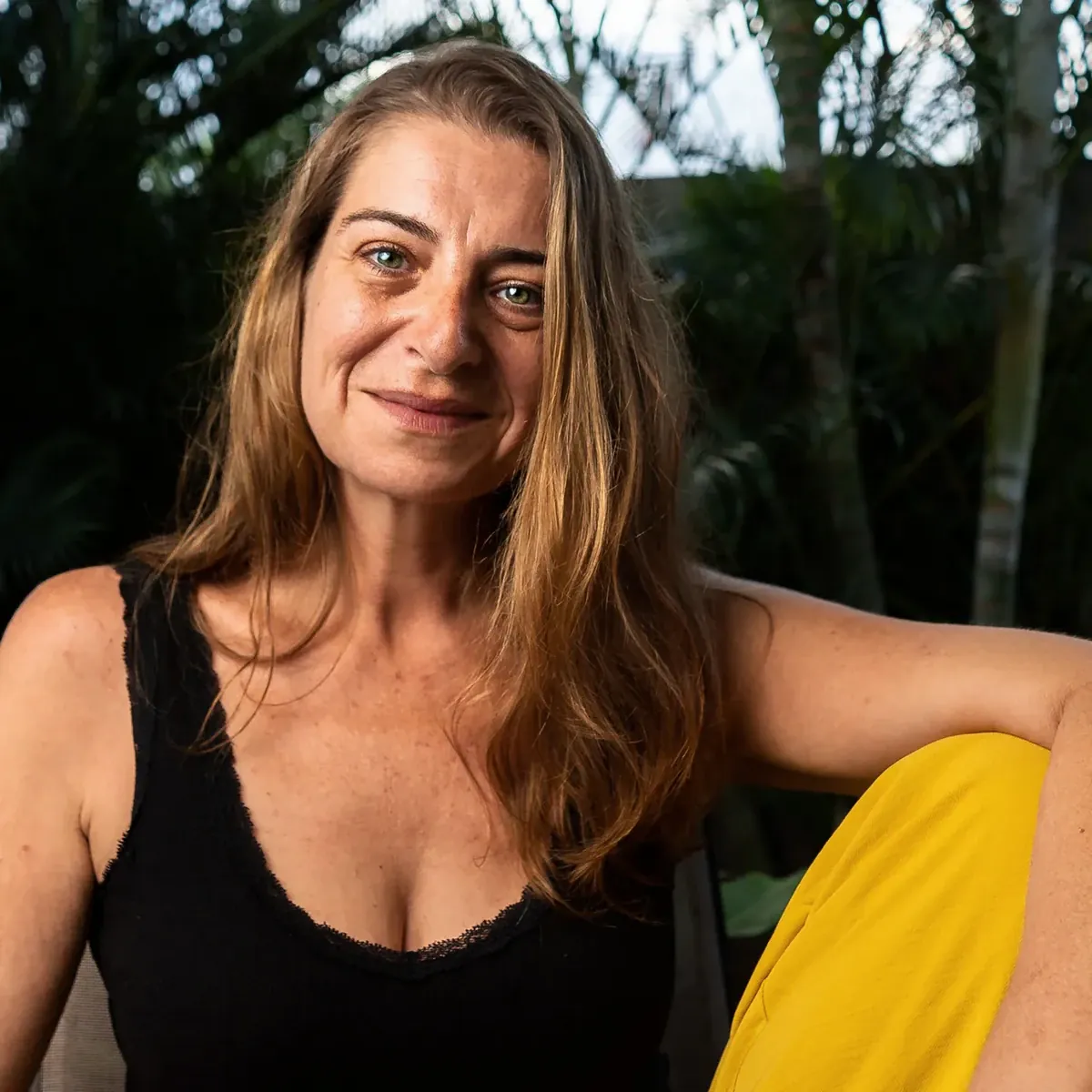 Casual outdoor portrait of Corinne Cerise photographed in natural light
