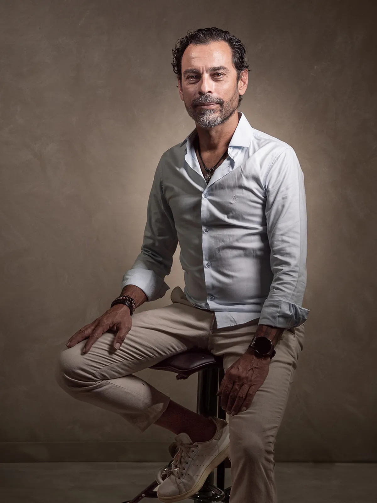 Professional seated portrait of real estate agent Oliver Zuffour