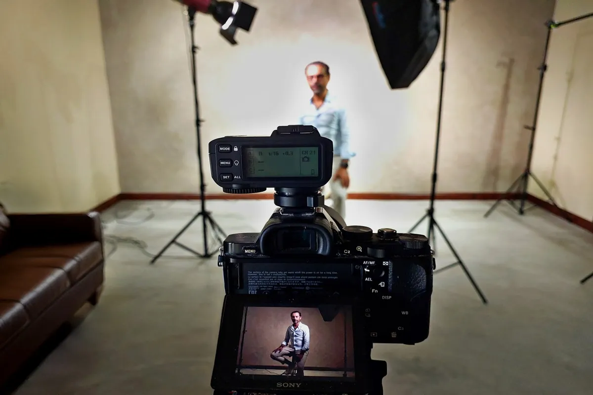 View from behind the camera during a portrait session at Boudoir Studio in Mauritius