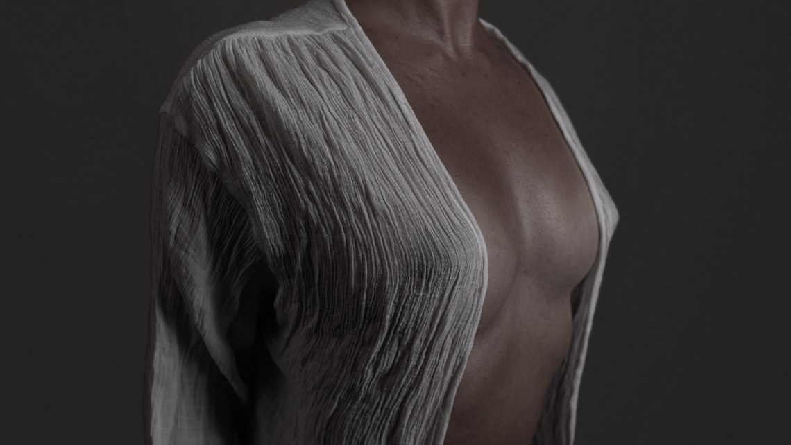 Girl wearing an opened see-trough white blouse