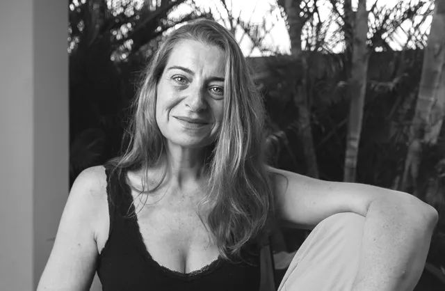 Outdoor garden portrait of woman over 40 in Mauritius