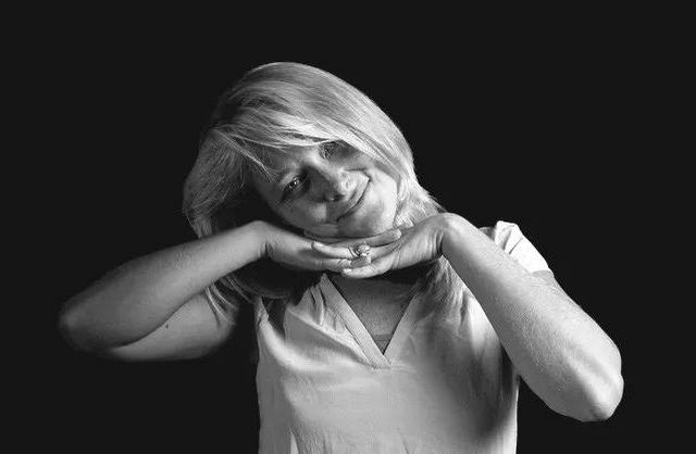 Portrait of smiling woman taken during personal photo shoot in Mauritius studio