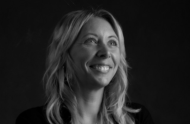 Studio portrait of a french smiling woman named Ophelie Sapin