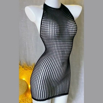 Black fishnet bodycon dress displayed on a mannequin in the studio.